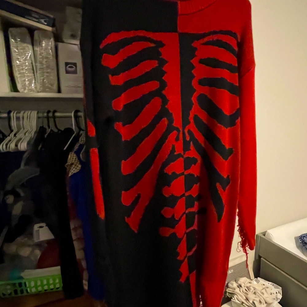 Skeleton sweater dress with rips